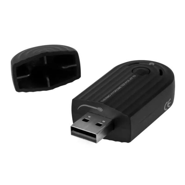 A black USB Wi-Fi adapter with its cap removed is shown in the image. The adapter has a sleek, rounded design with textured grooves on the body and a small LED indicator. The cap is placed to the left of the adapter.